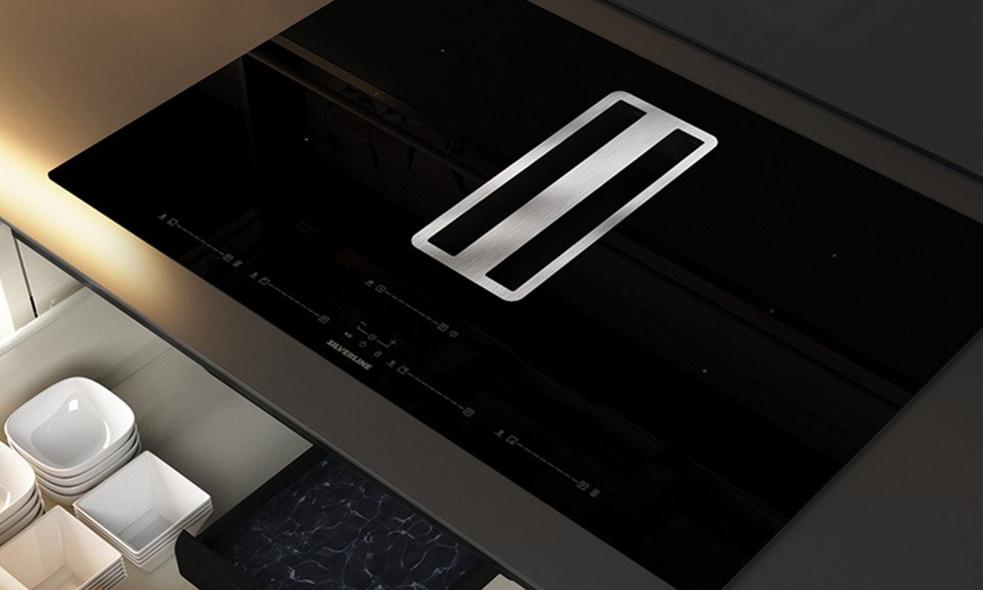 Silverline Herdplatte mit integriertem Kochfeldabzug in einer von Heiser's Küchen geplanten Küche.